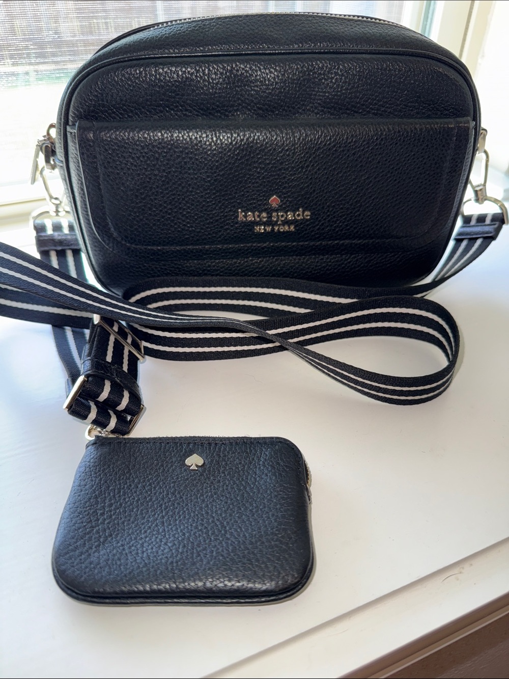 kate spade black pebbled leather crossbody with striped strap and coin pouch